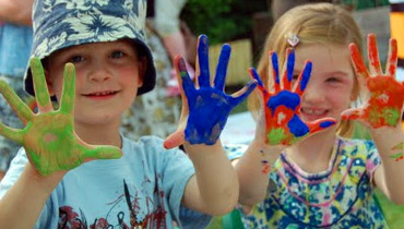 Children with paint on their hands