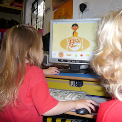 children using the computer at pre-school