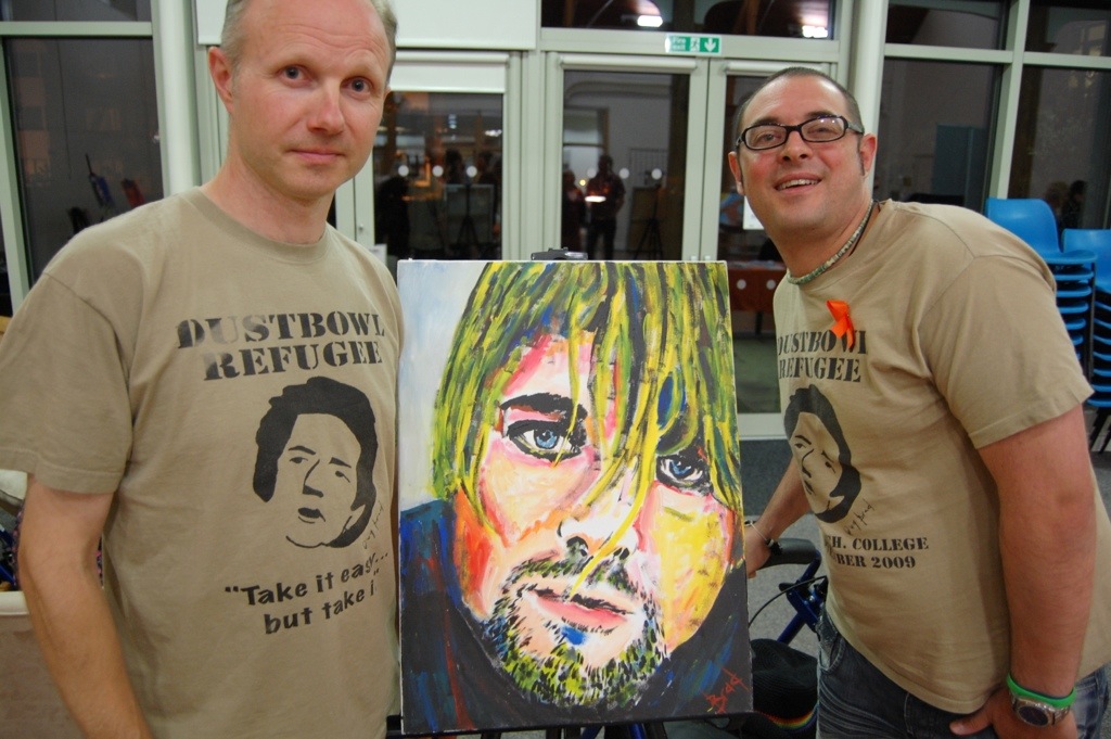 Brad and event organiser Alan Cook pose with the artist’s favourite painting – Kurt Cobain