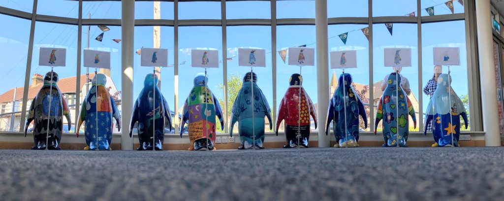 Penguin Waddle-on-Sea on watch out of the window of LRBC